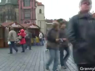 Old tourist is picked up and screwed on floor