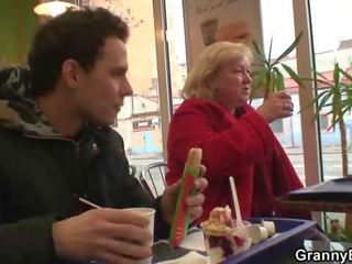 Young stud picks up huge grandma in cafe